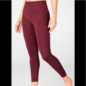 Fabletics Women's Rust Sync High-
Waisted Perforated 7/8 Legging.